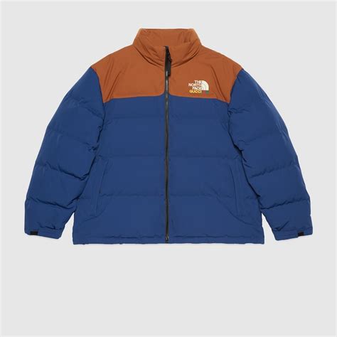 the north face gucci jas blauw bruin